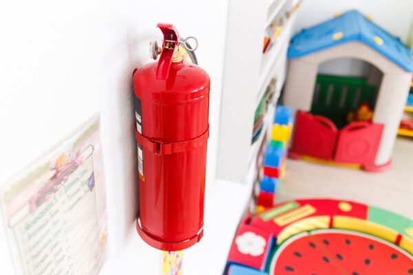 Fire,Extinguisher,For,Emergency,Management,In,Kindergarten.