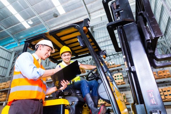 Asian,Fork,Lift,Truck,Driver,Discussing,Checklist,With,Foreman,In